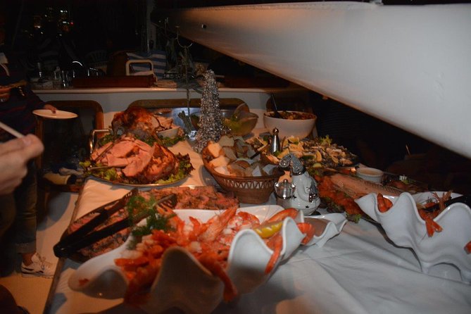 New Years Eve Sydney Harbour Cruise 2026-2027 - The onboard feast: lobster, oysters, and baked salmon